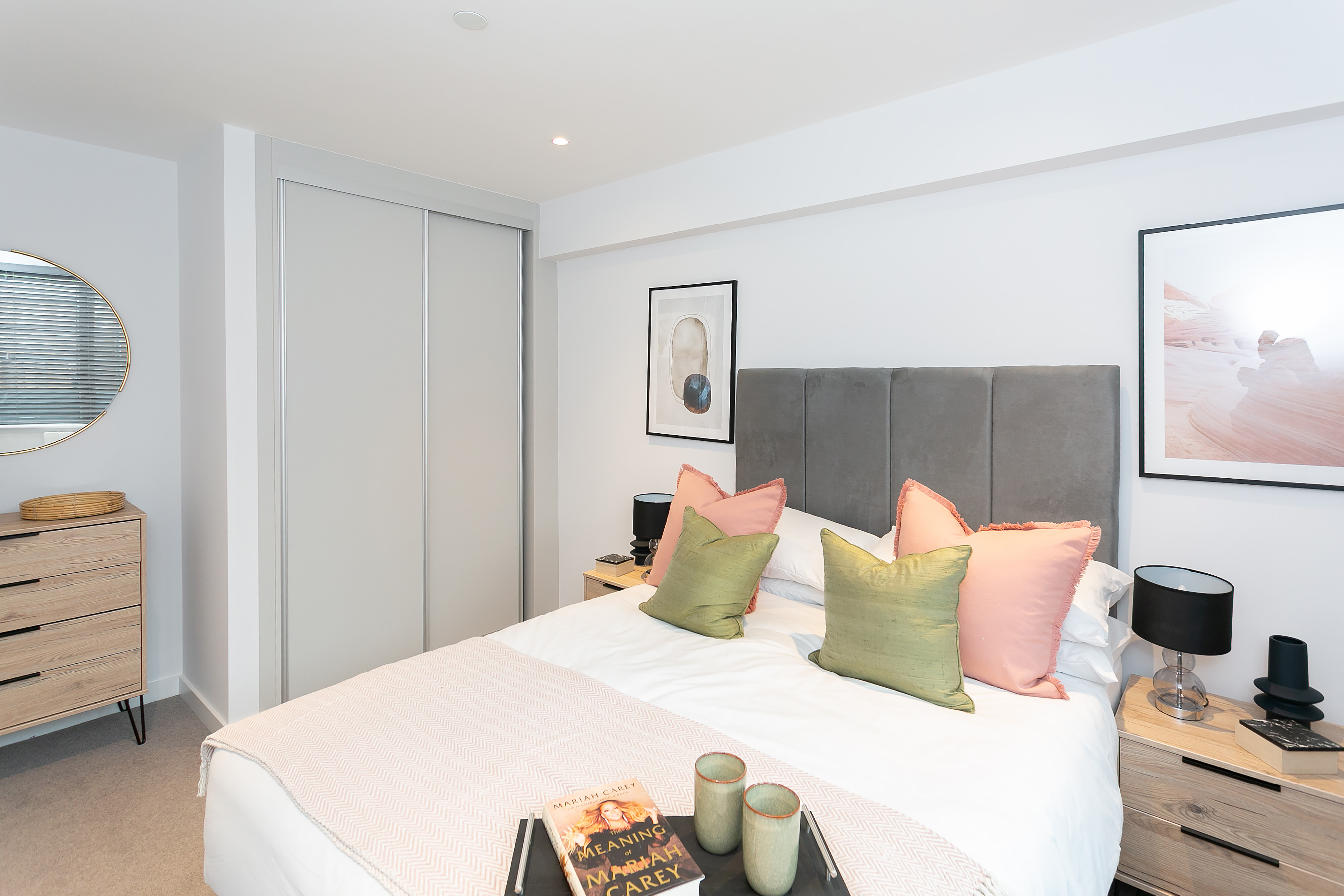 Master bedroom with fitted wardrobe and double bed